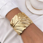 Waterproof 18K gold sculptural leaf cuff bracelet Biya Accessoires UAE.