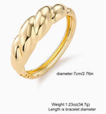 Luxury tarnish-free stainless steel sculptural jewelry for sensitive skin.