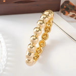 Waterproof 18K gold beaded statement bangle Biya Accessoires UAE.