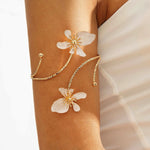 Waterproof 18K gold upper arm cuff with white enamel flowers Biya Accessoires UAE.