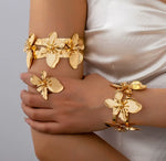 Waterproof 18K gold floral arm cuff and bangle set Biya Accessoires UAE.