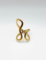 18K gold plated abstract infinity loop ring by Biya Accessoires.