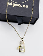 Hypoallergenic non-tarnish double pendant necklace with cubic zirconia.