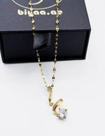 Hypoallergenic non-tarnish gold ribbon jewelry for women UAE.