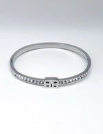 Hypoallergenic non-tarnish high polish silver rigid initial bangle UAE.