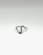 Waterproof silver geometric squiggle adjustable ring for women Dubai.