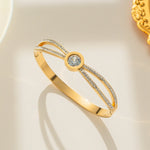Hypoallergenic non-tarnish high polish gold hinge clasp bangle UAE.