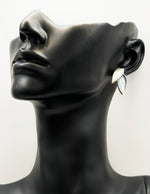 Best fashion jewelry in UAE botanical leaf earrings with emerald blue enamel.