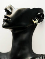 Close-up of premium hypoallergenic imitation jewelry featuring a crystal butterfly design.