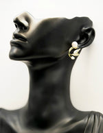 Best imitation jewellery brands in uae crystal leaf and pearl drop earrings.