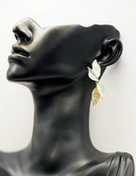 Biya Accessoires artificial jewellery online dubai pearlescent wing crystal crawlers.