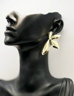 Everyday luxury jewelry uae modern botanical dangles from best jewelry shop in UAE.