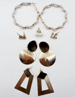 Biya Accessoires 6-pair gold earring set with textured geometric drops and pearls.