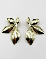 Biya Accessoires artificial jewellery online dubai molten gold leaf statement studs.