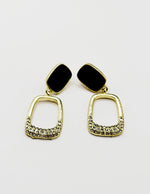 Biya Accessoires gold black enamel and crystal drop earrings.