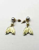 Elegant pearl and mermaid tail statement earrings for women.