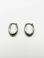 Best fashion jewelry in UAE thick silver statement hoops for women.