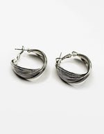 Close up of premium hypoallergenic imitation jewelry featuring a multi layered design.