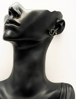 Best fashion jewelry in UAE midnight camellia floral studs for women.