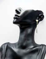 Everyday luxury fashion jewelry gold tone linear drops by Biya Accessoires Dubai.