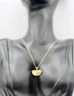 Waterproof non-tarnish artificial gold jewelry resting on a luxury presentation box.