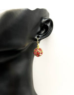 Best fashion jewelry in UAE pink sparkling floral earrings for women.