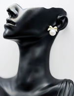 Everyday luxury jewelry uae coquette earrings by the best jewelry shop in UAE.