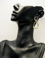 Elegant black and gold pavé crystal statement earrings for women.