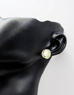 Close-up of premium hypoallergenic imitation jewelry featuring an asymmetrical halo design.