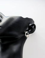 Best fashion jewelry in UAE criss cross crystal earrings for women.