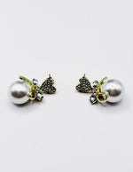 Biya Accessoires artificial jewellery online dubai crystal heart and pearl drop earrings.
