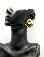 Biya Accessoires artificial jewellery online dubai gold geometric statement studs.