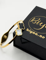 Hypoallergenic non-tarnish high polish gold rigid hinge clasp bangle UAE.
