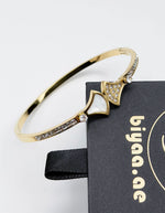 Waterproof gold dual texture geometric pave bracelet for women Dubai.