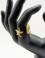 Waterproof gold asymmetrical sea star adjustable ring for women Dubai.