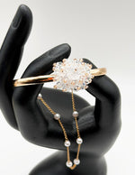 Non-tarnish clear crystal flower cuff and delicate chain set Dubai luxury fashion.