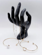 Non-tarnish gold statement jewelry set with heart and infinity motifs for women Dubai.