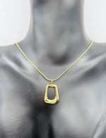 18K gold plated sculptural geometric pendant necklace in green gift box.