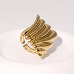 Modern luxury fine art editorial jewelry chunky liquid gold ring gift for her.