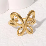 Modern luxury fine art editorial gold jewelry wire butterfly ring gift for her.