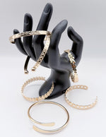 Waterproof 18K gold architectural bangle stack Biya Accessoires UAE.