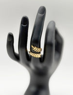 Hypoallergenic non-tarnish high polish botanical gold wrap ring UAE.