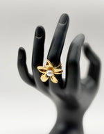 Waterproof gold large botanical bloom with pearl adjustable ring Dubai.