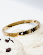 Hypoallergenic non-tarnish high polish gold rigid flat bangle UAE.