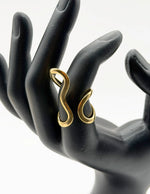 Hypoallergenic non-tarnish high polish architectural crossover ring UAE.