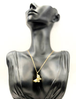 Biya Accessoires marquise cut crystal butterfly necklace in 18K gold plating.