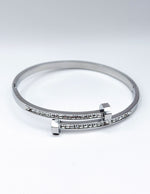 Waterproof silver bypass bangle with baguette crystals Biya Accessoires UAE.