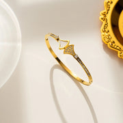 18K gold plated Art Deco fan bangle with pearl and crystals by Biya Accessoires.