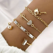 Waterproof 18K gold romantic charm bangle stack Biya Accessoires UAE.