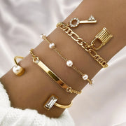 Waterproof 18K gold luxury charm bracelet stack Biya Accessoires UAE.